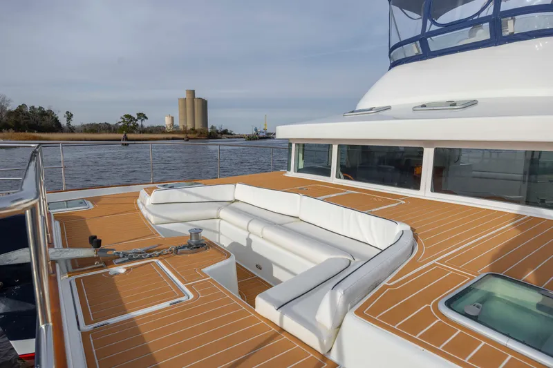  Yacht Photos Pics Luxurious 2004 Lagoon 43 PC yacht with spacious deck and comfortable seating.