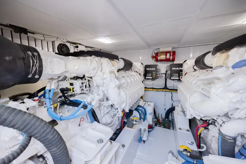  Yacht Photos Pics Engine room of a 2022 Bertram 50 yacht, featuring dual MAN engines.