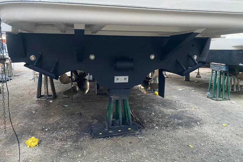  Yacht Photos Pics 2007 Cruisers Yachts 560 Express propellers and hull on dry dock.