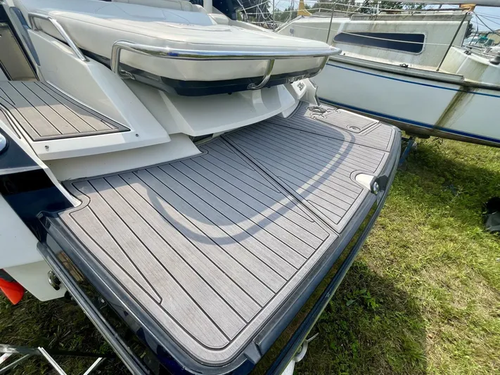  Yacht Photos Pics 2012 Monterey 328 SS boat with spacious rear deck and sleek design.