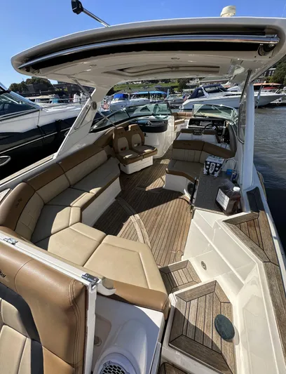  Yacht Photos Pics 2014 Sea Ray 350 SLX boat with spacious seating and elegant interior design.