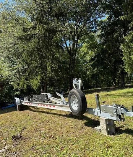  Yacht Photos Pics Trailer for 2014 Sea Ray 350 SLX boat in a wooded area.