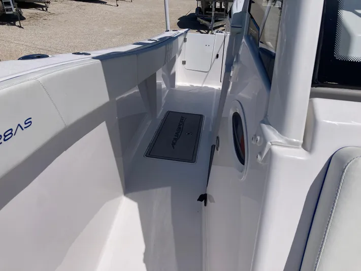  Yacht Photos Pics 2025 Aquasport 28AS boat deck, featuring sleek design and modern amenities.