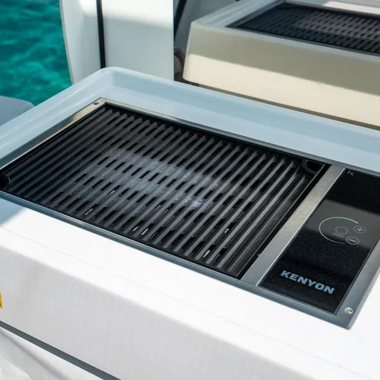 Gwint Yacht Photos Pics Kenyon grill on 2019 Beneteau Oceanis Yacht 62, perfect for outdoor cooking.