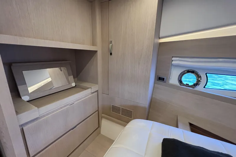  Yacht Photos Pics Luxurious interior of 2021 Solaris Power 48 OPEN yacht with modern wood finish.