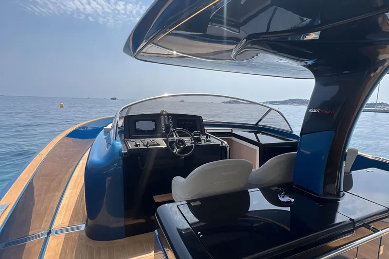  Yacht Photos Pics 2021 Solaris Power 48 OPEN yacht interior with sleek design and modern controls.