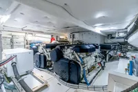 Engine room of 2021 Solaris Power 48 OPEN yacht, showcasing dual engines and mechanical systems.