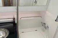 2024 Nimbus T11 X-EDITION bathroom with sink, mirror, and showerhead.