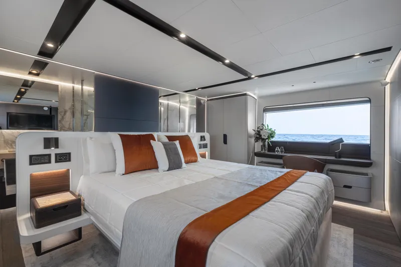  Yacht Photos Pics Luxurious 2024 Astondoa AS8 yacht bedroom with ocean view, modern design, and elegant decor.
