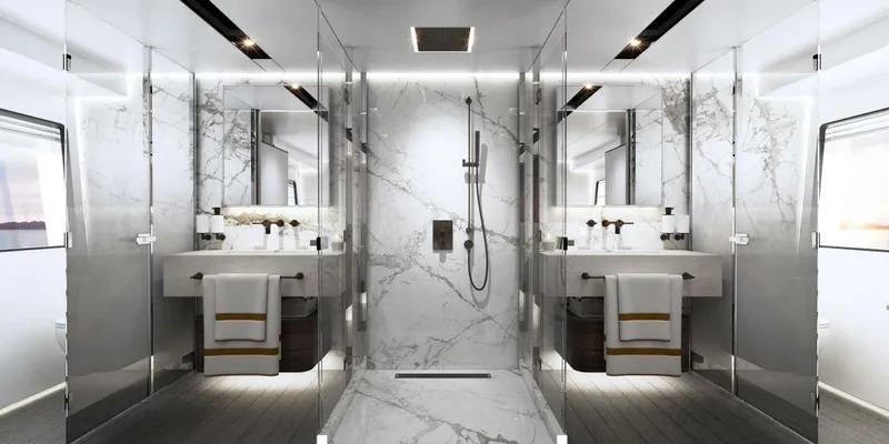  Yacht Photos Pics Luxurious marble bathroom in 2024 Astondoa AS8 yacht, featuring dual sinks and a spacious shower.