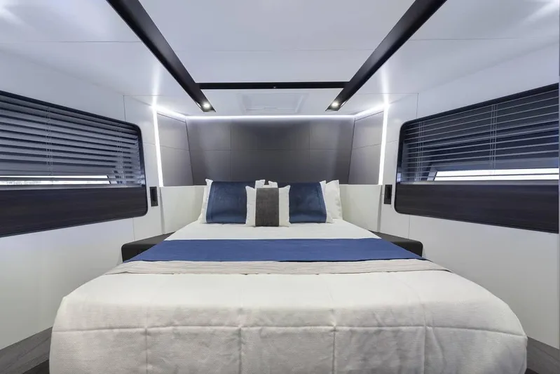  Yacht Photos Pics Luxurious bedroom interior of 2024 Astondoa AS8 yacht with modern design.
