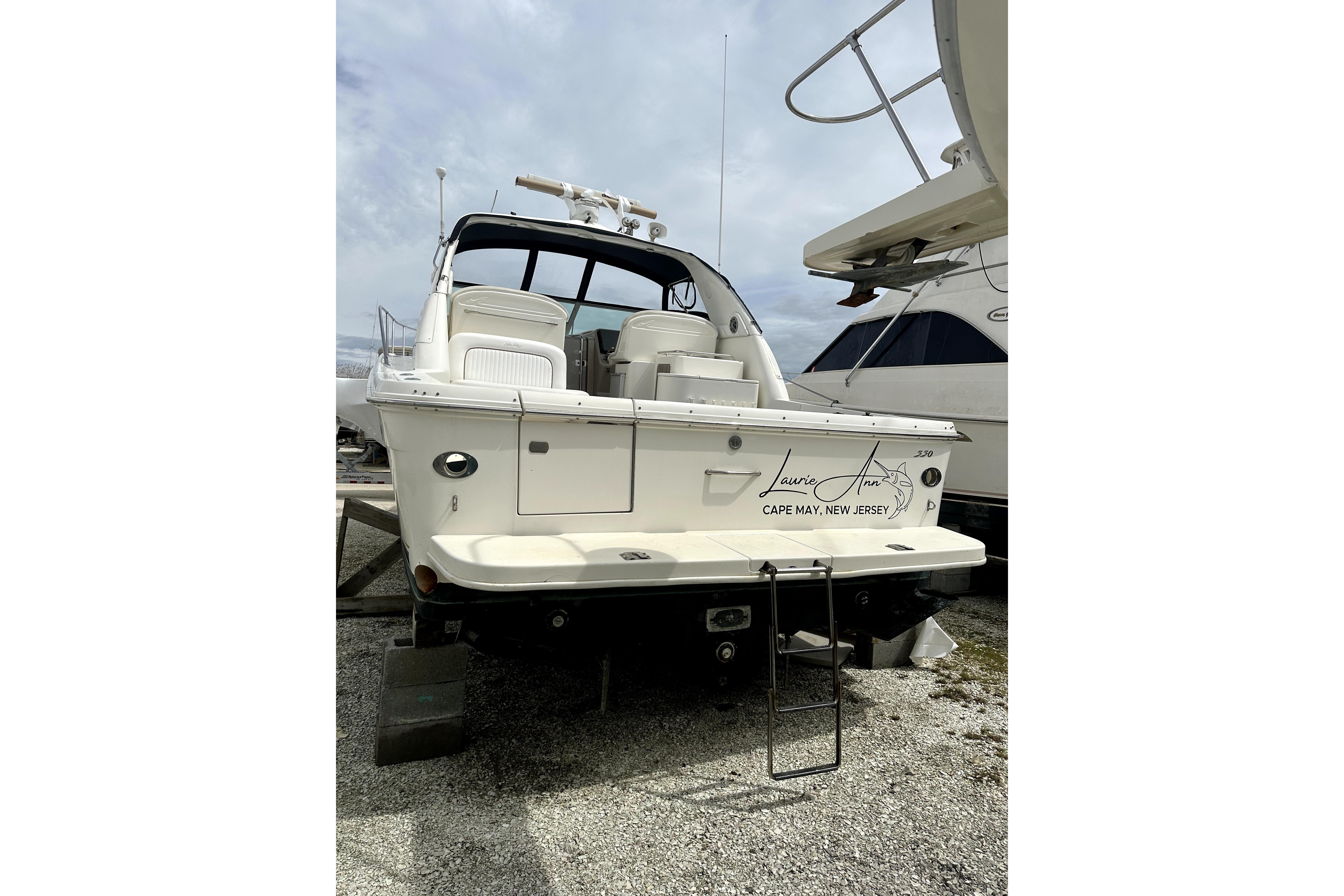 1998 Sea Ray 340 Amberjack boat docked, rear view, Cape May, New Jersey.