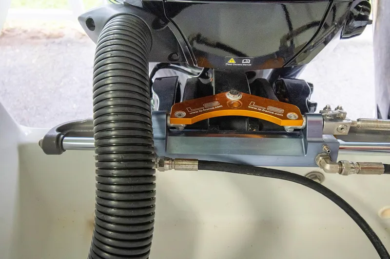  Yacht Photos Pics Close-up of Jeanneau Leader 9.0 CC 2020 boat engine components and tubing.