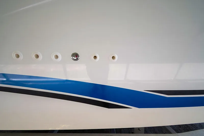  Yacht Photos Pics 2020 Jeanneau Leader 9.0 CC boat hull with blue and black stripes.