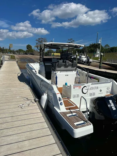  Yacht Photos Pics 2020 Jeanneau Leader 9.0 CC boat docked under a clear blue sky.