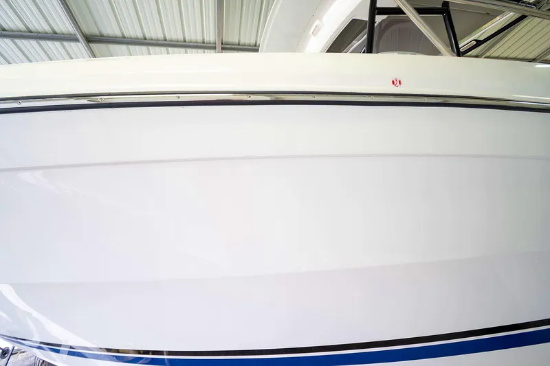  Yacht Photos Pics 2020 Jeanneau Leader 9.0 CC boat hull in a storage facility.