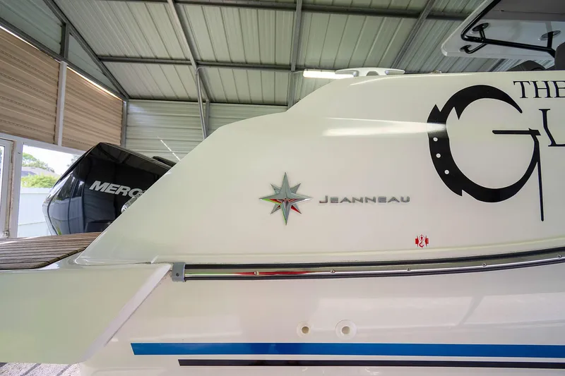  Yacht Photos Pics 2020 Jeanneau Leader 9.0 CC boat in a covered storage area.