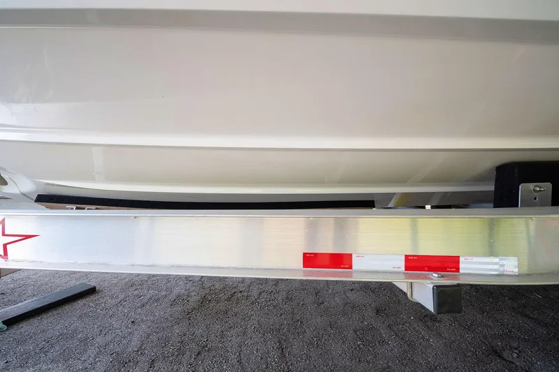  Yacht Photos Pics 2020 Jeanneau Leader 9.0 CC boat hull on trailer, close-up view.