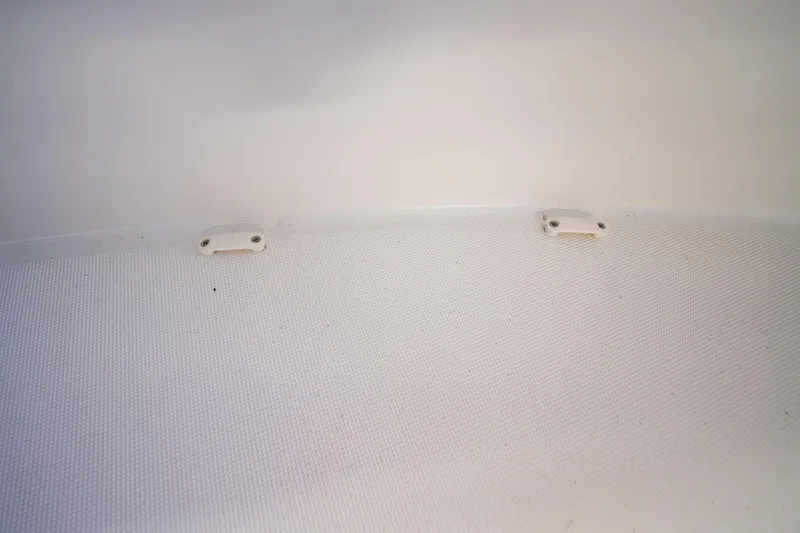  Yacht Photos Pics Interior detail of 2020 Jeanneau Leader 9.0 CC boat, featuring a textured white surface.