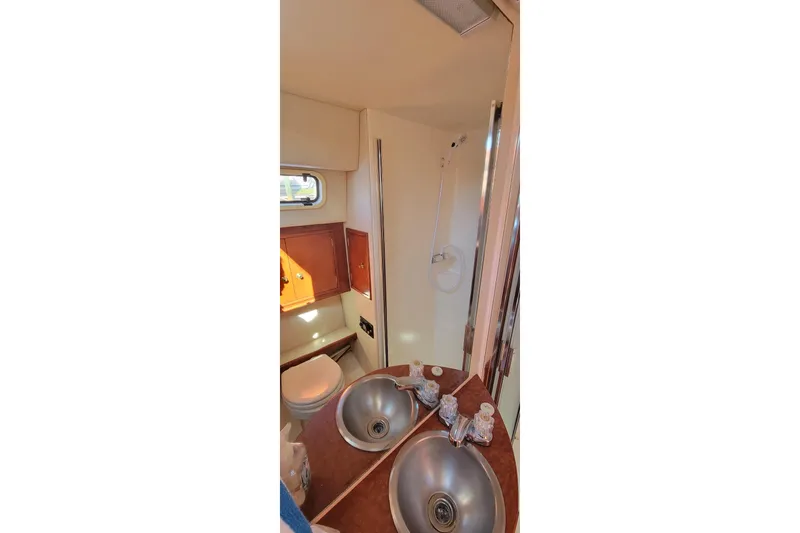  Yacht Photos Pics 2001 Zeta 32 Power Cat bathroom with dual sinks and shower.