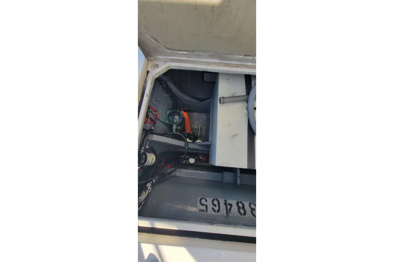  Yacht Photos Pics Engine compartment of a 2001 Zeta 32 Power Cat boat, showing mechanical components.