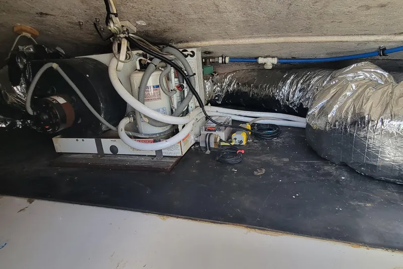  Yacht Photos Pics Engine compartment of 2001 Zeta 32 Power Cat with visible wiring and ductwork.