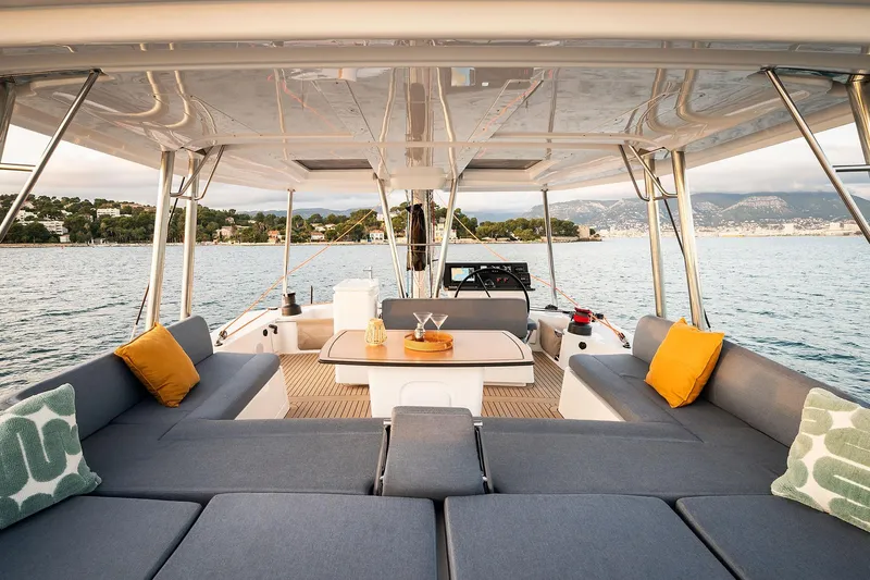 Lumiere Yacht Photos Pics Luxurious 2026 Bali 5.2 yacht interior with spacious seating and scenic ocean view.