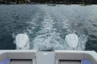 Aquila Molokai 28 (2022) boat with twin Mercury engines on water.