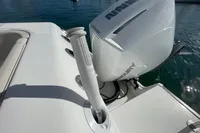 Aquila Molokai 28 boat, 2022 model, featuring a Mercury outboard motor on calm water.