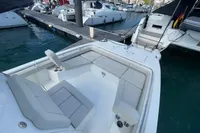 Aquila Molokai 28, 2022 model, docked with spacious seating area.