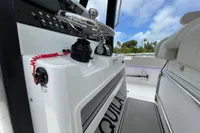 Aquila Molokai 28 boat dashboard, 2022 model, featuring steering controls and seating.