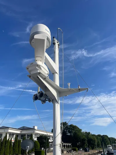 Southerly Yacht Photos Pics Radar and communication equipment on a Lyman-Morse 52 yacht, 1990 model, under clear blue sky.
