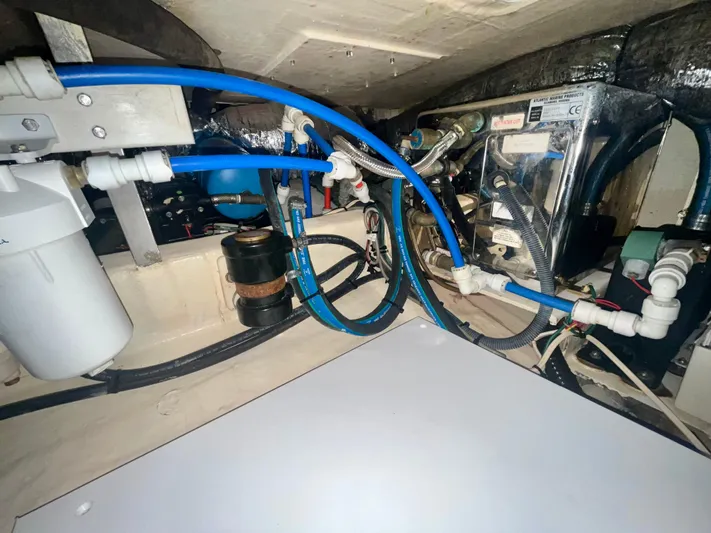  Yacht Photos Pics Engine compartment of a 2005 Hinckley Picnic Boat EP with visible wiring and components.