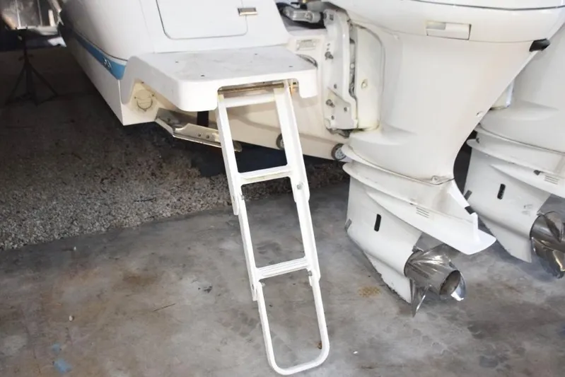 Oz Yacht Photos Pics Fold out swim ladder from under side transom platform.