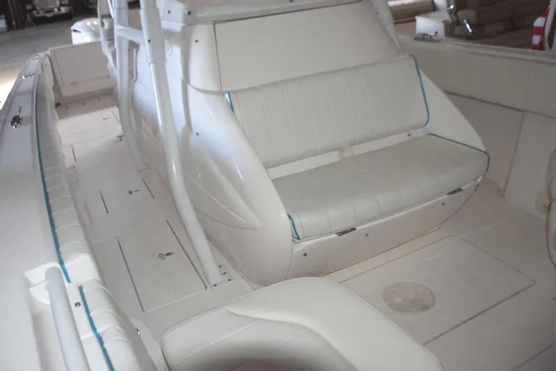 Oz Yacht Photos Pics Seat on front of console with built in cooler beneath seat.