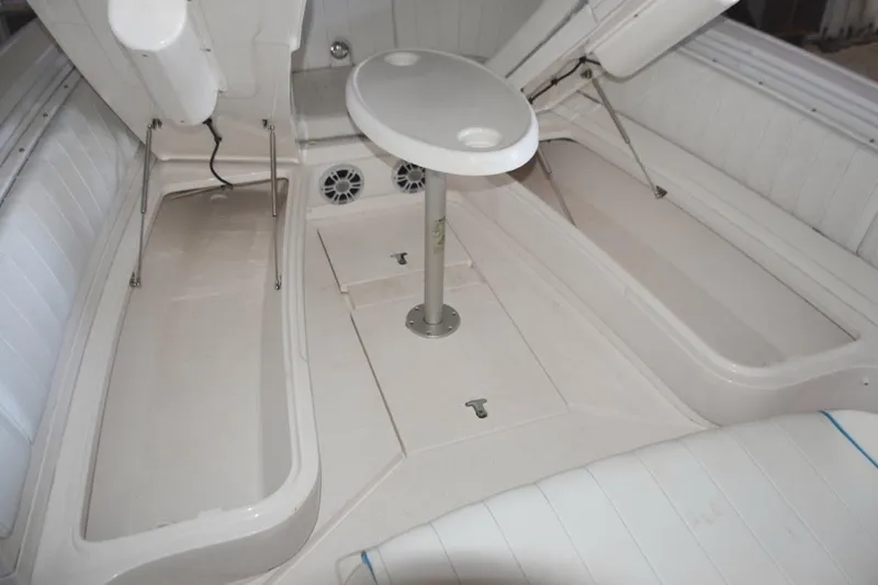 Oz Yacht Photos Pics Larger storage compartments accessed with gas shock lifts beneath forward seating bases