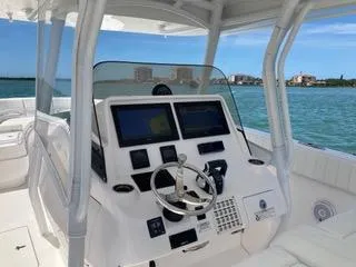  Yacht Photos Pics 2019 Intrepid 400 Center Console boat dashboard with dual screens on open water.
