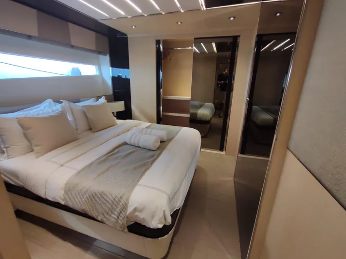  Yacht Photos Pics Luxurious bedroom interior of 2017 Dominator Ilumen 28 yacht with modern design.