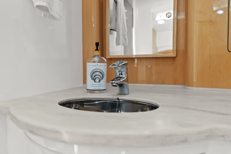 Damn Lucky Yacht Photos Pics Luxury bathroom sink in 2019 Intrepid 475 yacht with soap dispenser.