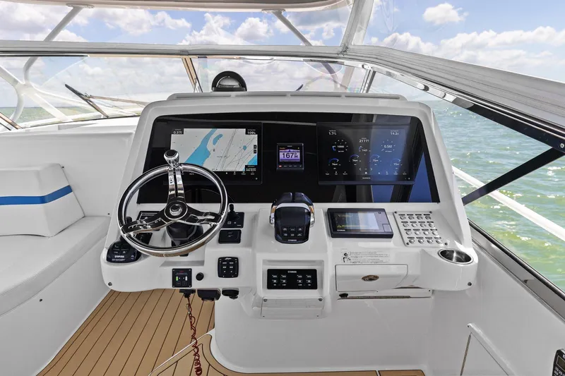 Damn Lucky Yacht Photos Pics Helm of 2019 Intrepid 475 boat with advanced navigation and control systems.