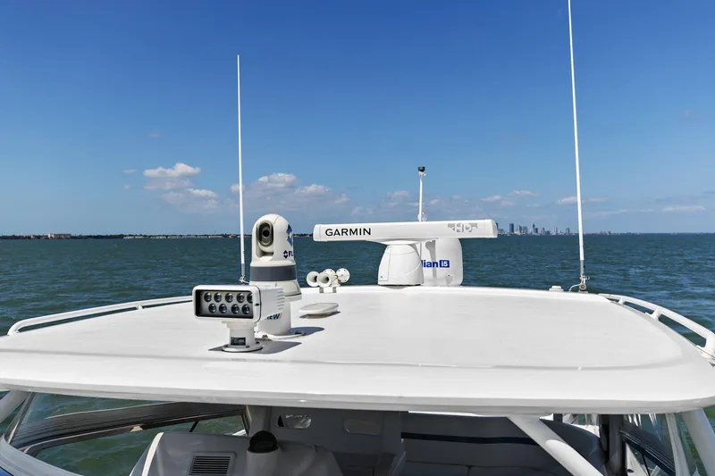 Damn Lucky Yacht Photos Pics 2019 Intrepid 475 boat with Garmin radar on open water.