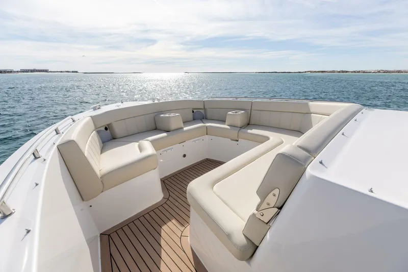 New Mjm 4 Yacht Photos Pics Luxurious seating on 2025 MJM 4 boat, overlooking serene ocean waters.