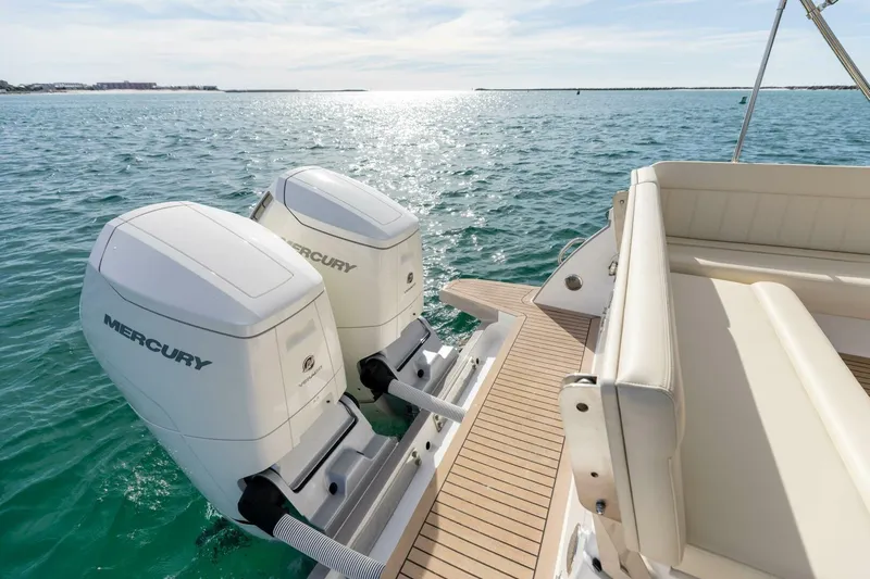 New Mjm 4 Yacht Photos Pics 2025 MJM 4 boat with dual Mercury outboard engines on a sunny day.