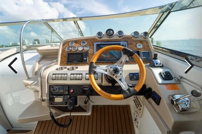  Yacht Photos Pics Cockpit of 2011 Formula 400 Super Sport boat with modern controls and steering wheel.