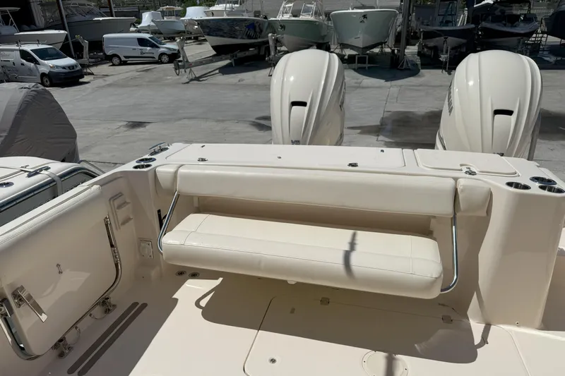 335-714 Used Yacht Photos Pics 2021 Grady-White Freedom 335 boat with foldable seating and dual outboard engines.