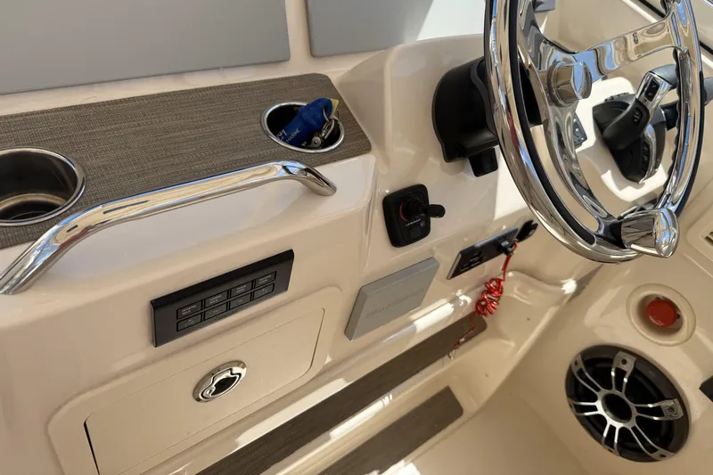 335-714 Used Yacht Photos Pics 2021 Grady-White Freedom 335 boat dashboard with steering wheel and controls.