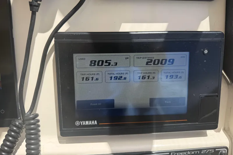 335-714 Used Yacht Photos Pics Yamaha display showing fuel usage and trip data on Grady-White Freedom 335 boat.