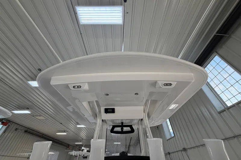 White Yacht Photos Pics 2024 Regulator 34 boat interior, showcasing sleek design and modern features.