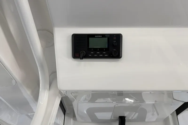 White Yacht Photos Pics 2024 Regulator 34 boat interior with Garmin marine radio installed.
