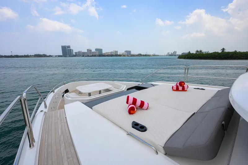  Yacht Photos Pics Luxury Sirena 88 yacht deck with sun loungers, ocean view, 2024 model.
